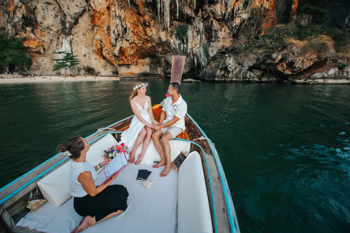 Private Vow-0213 Rose and her fiancé's private wedding vows on a long-tail boat around Railay Beach , Krabi Thailand