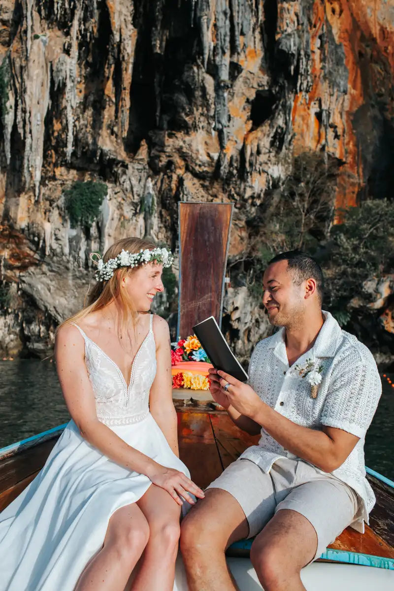 Private Vow-0216 Rose and her fiancé's private wedding vows on a long-tail boat around Railay Beach , Krabi Thailand