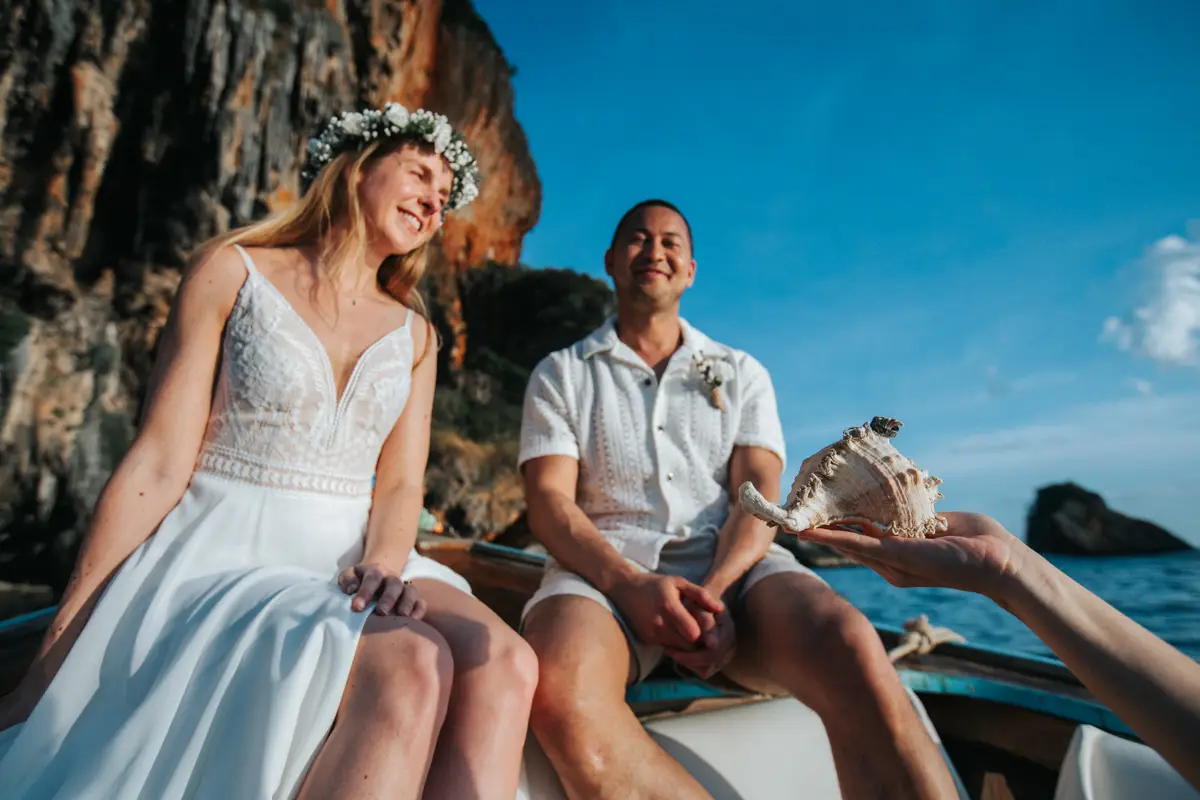 Private Vow-0218 Rose and her fiancé's private wedding vows on a long-tail boat around Railay Beach , Krabi Thailand