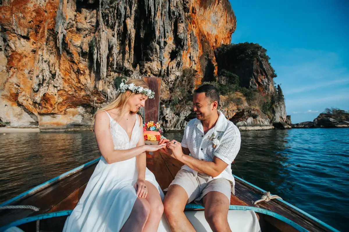 Private Vow-0219 Rose and her fiancé's private wedding vows on a long-tail boat around Railay Beach , Krabi Thailand