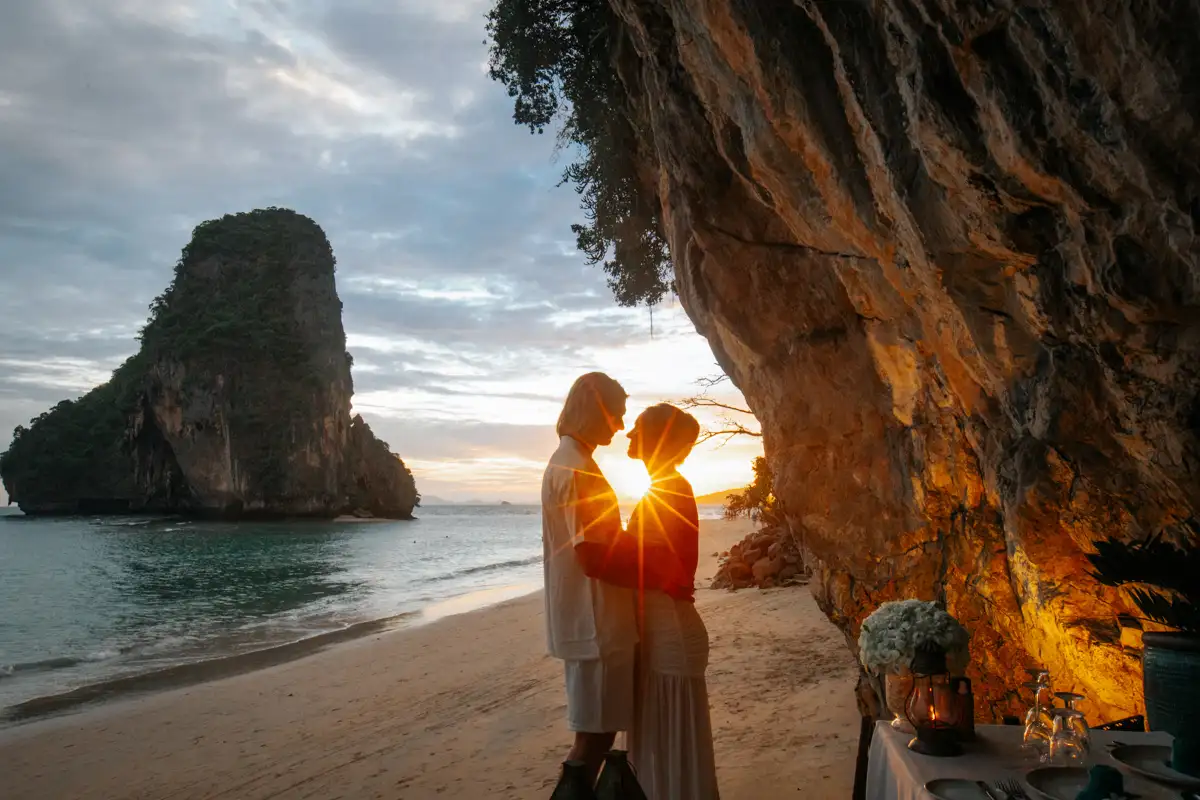 Private Vows at Railay of Eric and Corrine by long tail boat around Railay and Pra Nang beach during Thailand's beautiful summer season.The couple stayed at Rayavadee hotel,